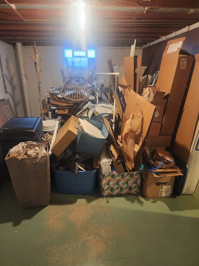 Roll-off dumpster container at job site for 2 Yard Dumpster Rental in Cypress Gardens